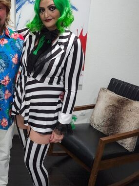 Costume. Wig Included, Black & White Stripes with Thigh-High Leggings